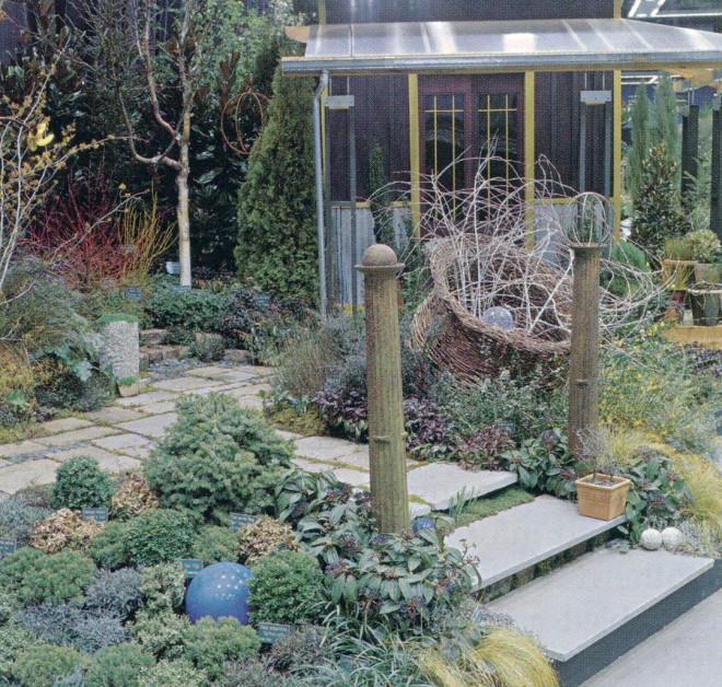“A Winter’s Passing (in the Garden),” created by Lorene Edwards Forkner and Sally Sykes-Wylie, of Fremont Gardens, for the Arboretum Foundation at the 2001 Northwest Flower & Garden Show, captured the essence of designing for wintertime effects in a Northwest garden. Witch hazel (Hamamelis) and shrubby dogwoods (Cornus)with colorful twigs bring a sparkle to the background, while the white stems of Rubus biflorus var. quinqueflorus) burst from a woven cedar vessel (by Sue Skelly). An array of evergreen foliage provides winter-long interest, while whimsical sculptural pieces capture the eye. The transparent roof protects against rain without darkening a front porch graced by containers of tender plants. Paving allows safe access throughout the wet winter. Photographs by David McDonald, except as noted