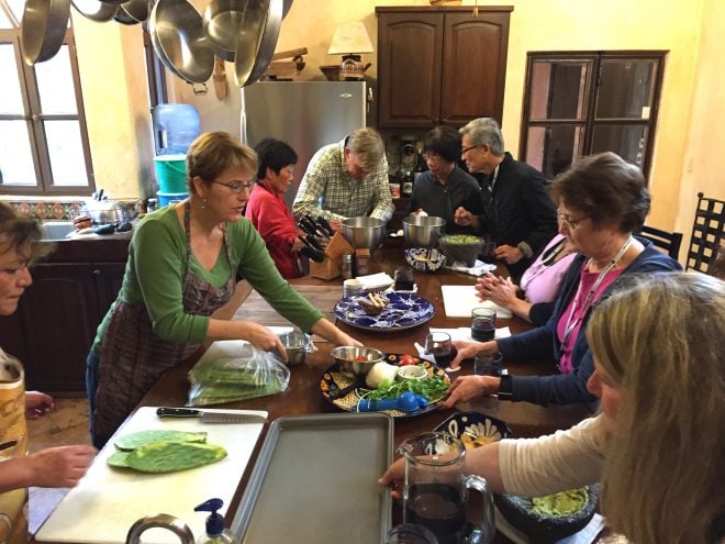 Mixing it up in the kitchen with a hands-on lesson in creating an authentic Mexican Meal. Photo: Scott Borden