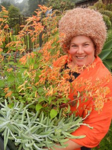 Christina with a flat of Cuphea 'Strybing Sunset' and native dudleya cuttongs from a plant on the Esalen property. Photo: Robin Wilson