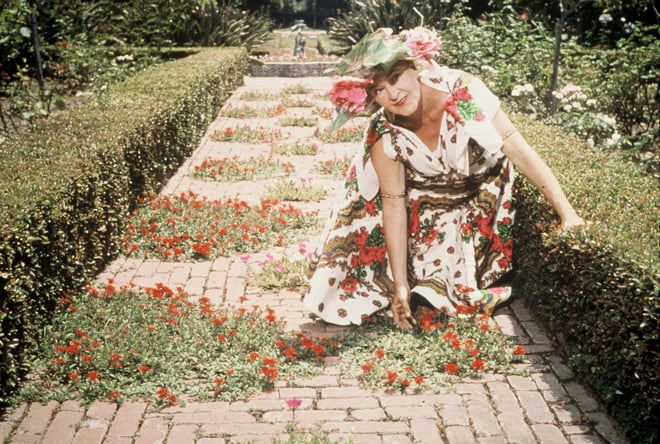 Madame Ganna Walska kneeling in the garden in the late 1950s. Photo: Ganna Walska Lotusland.