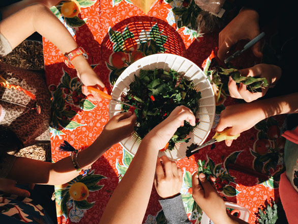 Kids pitch in to make a meal at Bay Farm Elementary. Photo: Ethan Bodnar