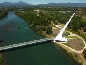 An early photo of the Sundial Bridge at Turtle Bay crossing the Sacramento River. Photo: courtesy of the Redding Convention & Visitors Bureau